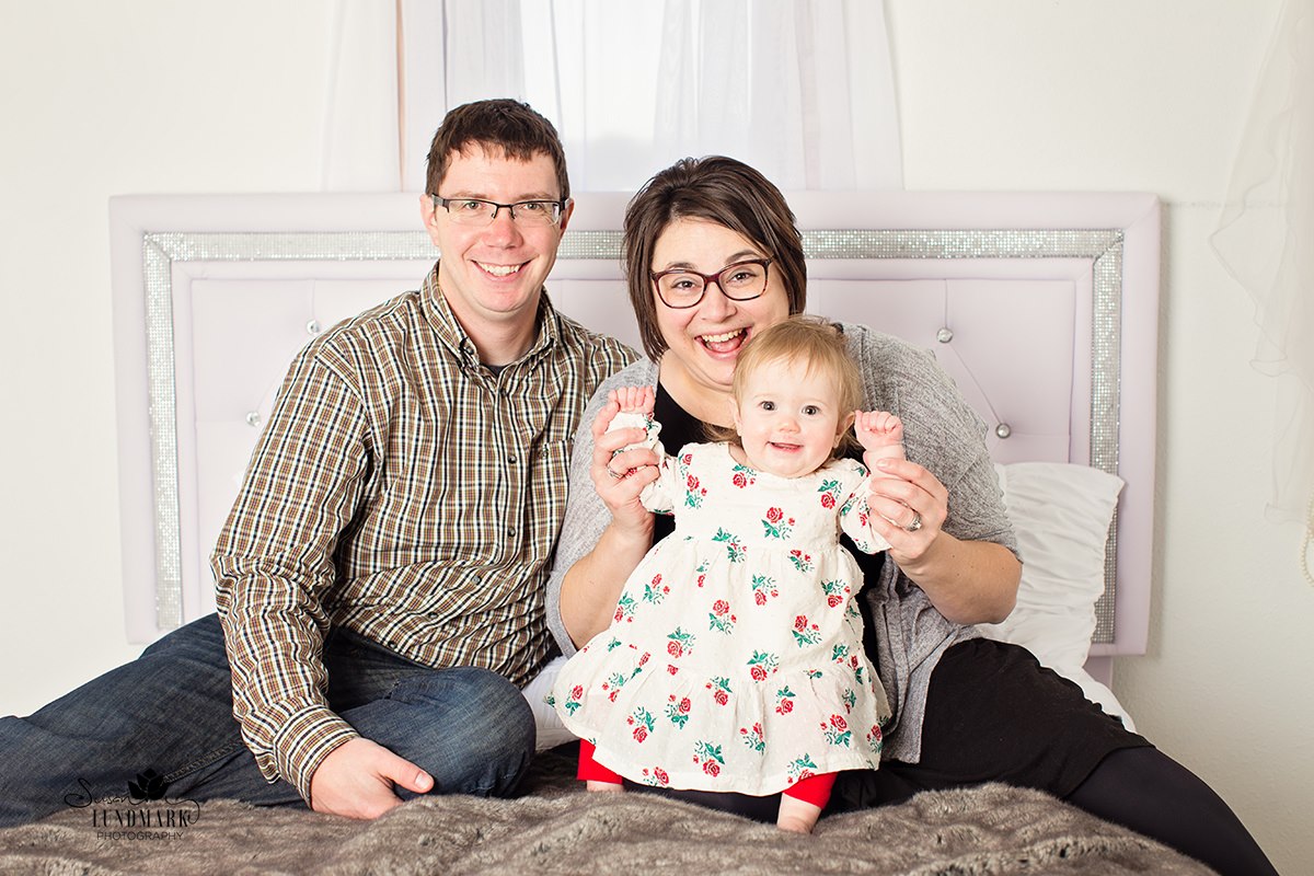 Atlas and her adoptive parents