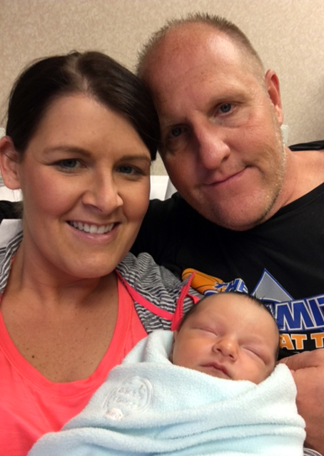 New Mom and Dad with their baby boy.