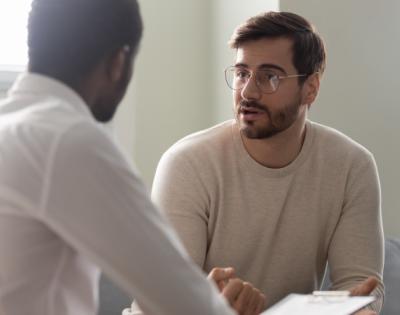 Man receiving a substance use evaluation