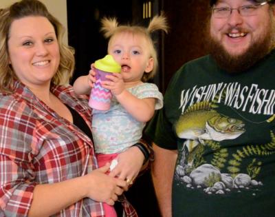 Kristin and Bernie with their adopted daughter Aubrey