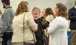 Employees enjoy visiting with each other