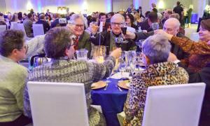 Guests clink glasses at Wine and Dine