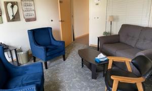 The office features a comfortable group room