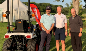 From left Village Development Director David Newman Doosan Bobcat President Mike Ballweber Open Tournament Director Mark Johnson in 2021