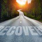 Road with the word recovery across it