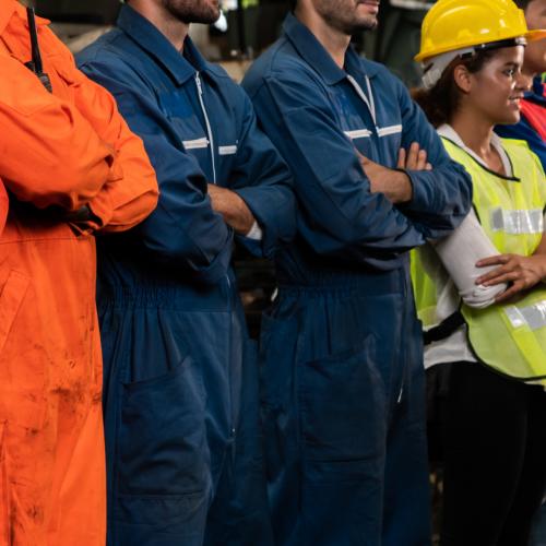 Factory workers standing in line