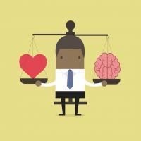 animated person balancing heart and brain on scale